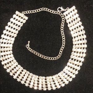 Silver choker rhinestones.